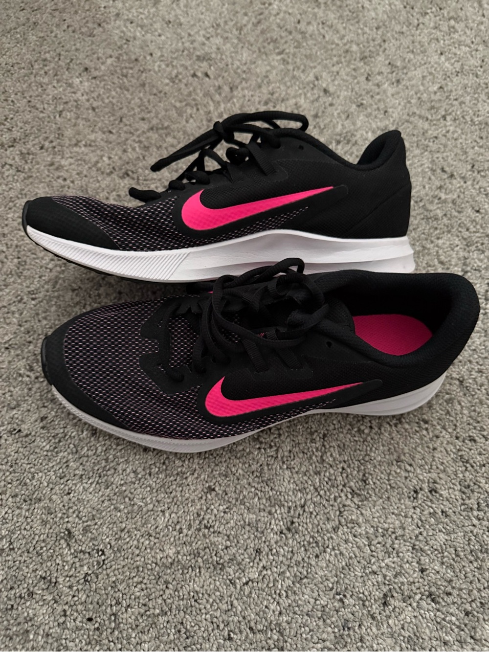 Nike Kids Black Sneakers with Pink Swoosh